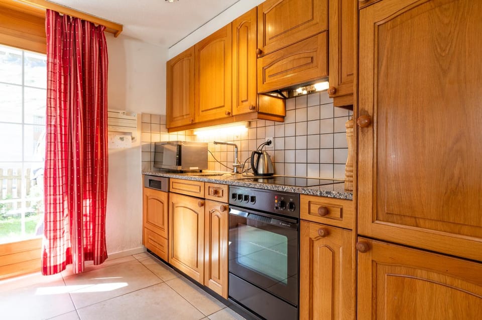 Kitchen or kitchenette, stove, kitchen