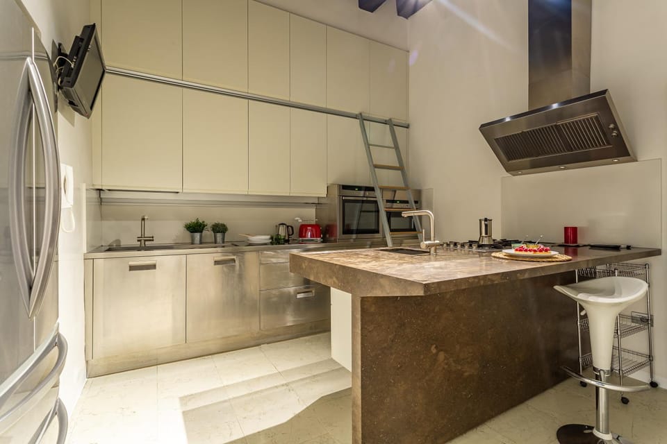 Kitchen or kitchenette, dishwasher, oven, stove, toaster