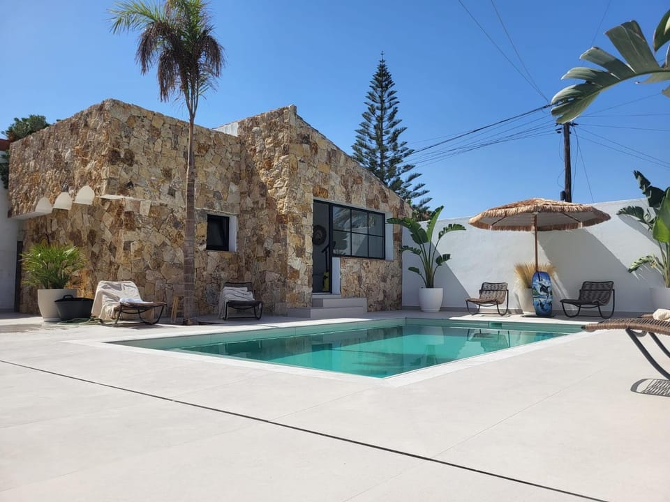 Property building, Living room, Swimming pool