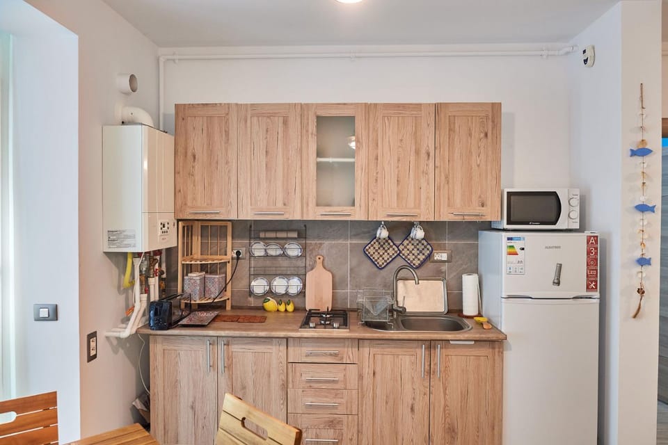 Kitchen or kitchenette, stove