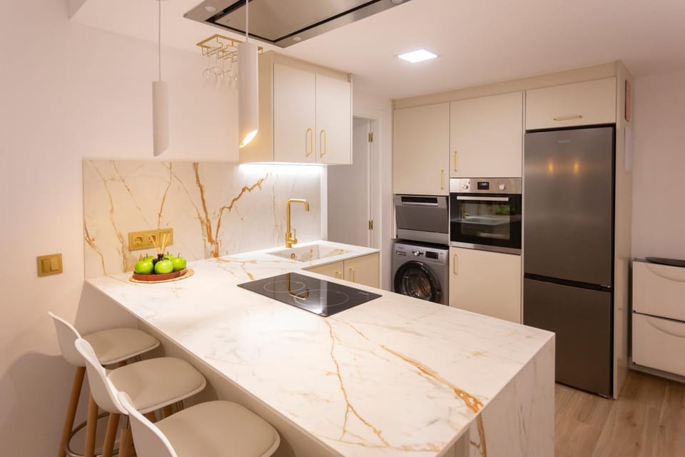Kitchen or kitchenette, dishwasher, oven, stove, washing machine, kitchen
