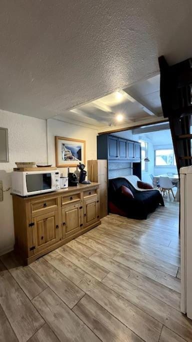 Photo of the whole room, stove, toaster