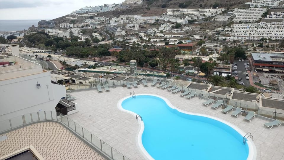 Property building, Living room, Swimming pool