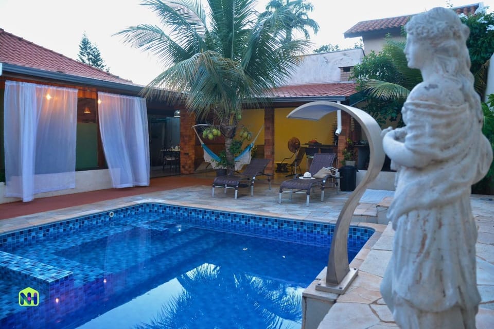 Property building, Pool view, Swimming pool, sunbed