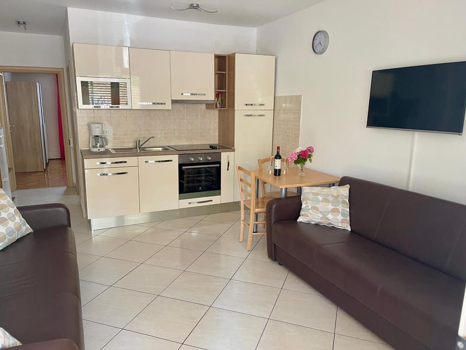 Kitchen or kitchenette, Living room, Seating area, Dining area, oven, stove, toaster