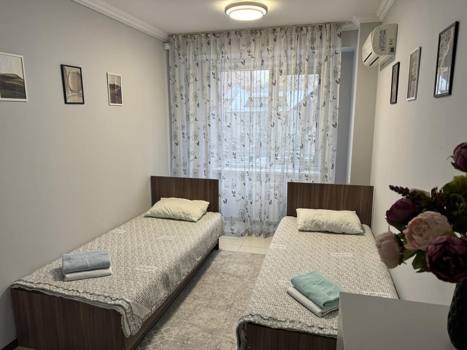 Bed, Photo of the whole room, Bedroom, towels, air conditioner