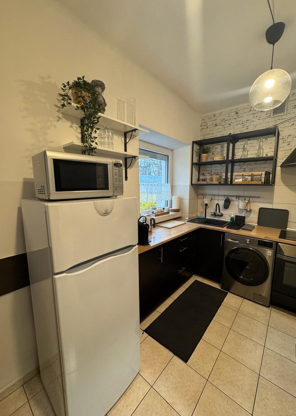 Kitchen or kitchenette, microwave, stove, kitchen