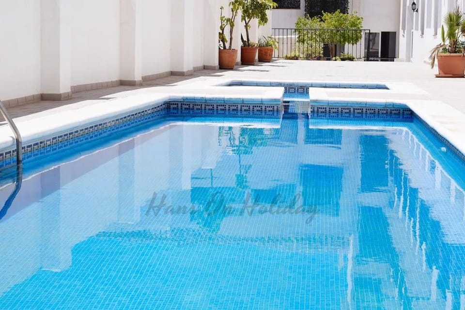 Penthouse 5 Arcos, Frigiliana, 2 bedroom, Pool, Large roof Terrace, BBQ and Amazing views HansOnHoliday Rentals Apartment in Frigiliana