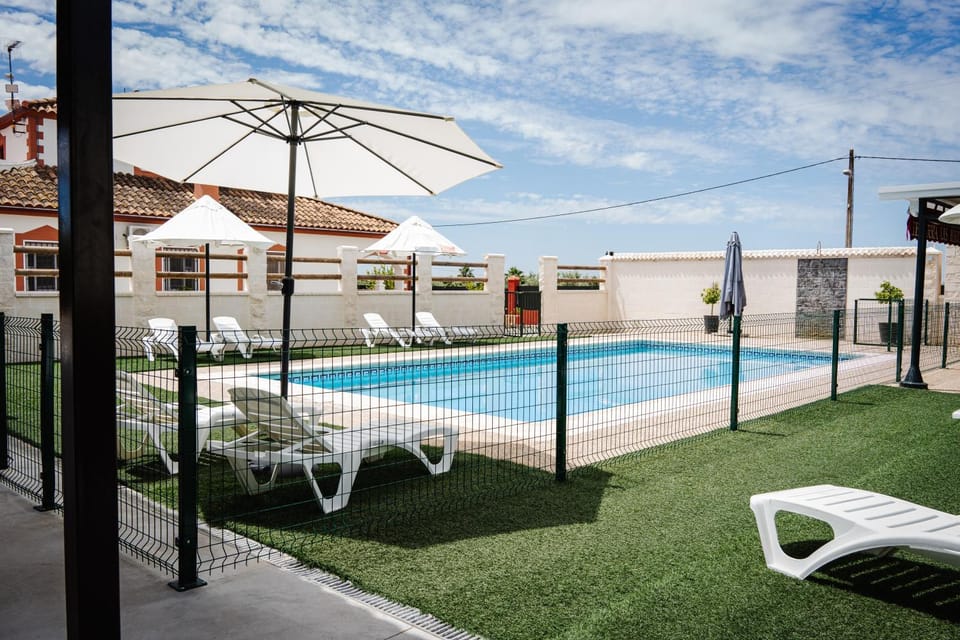 Property building, Living room, Swimming pool