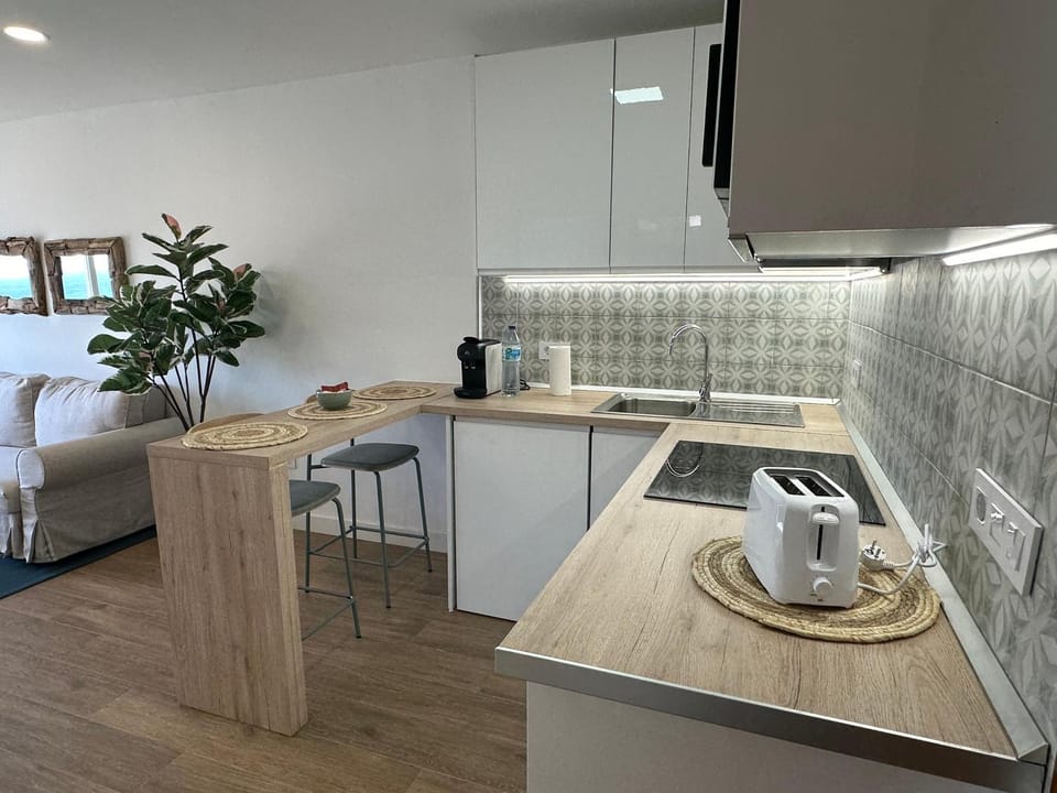 Dining area, stove, toaster, kitchen