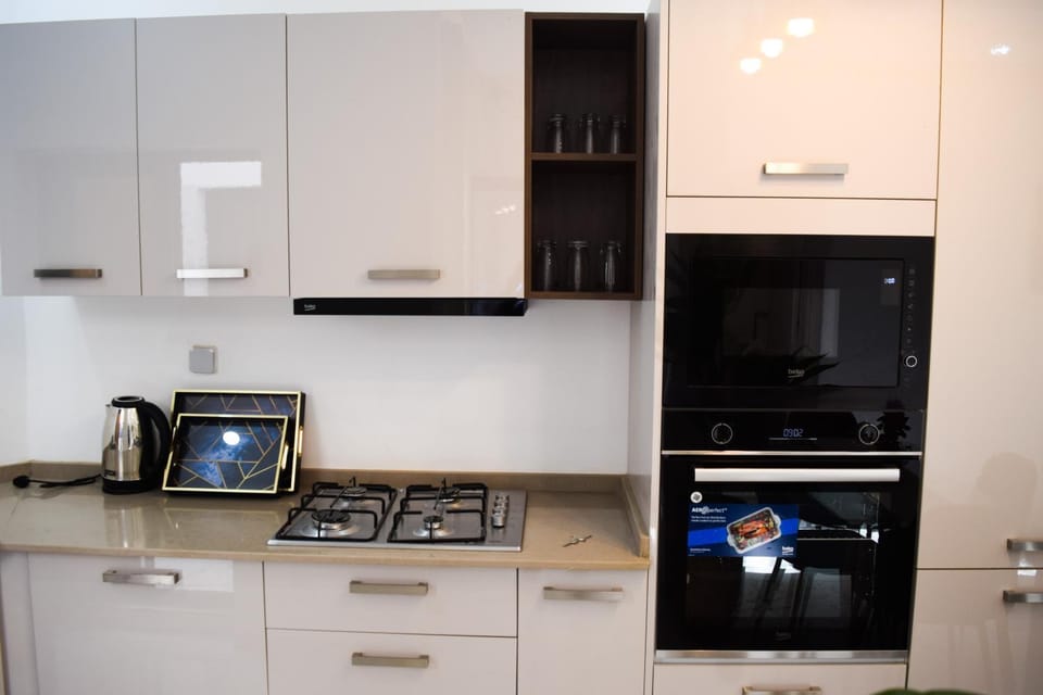 Coffee/tea facilities, Kitchen or kitchenette, oven