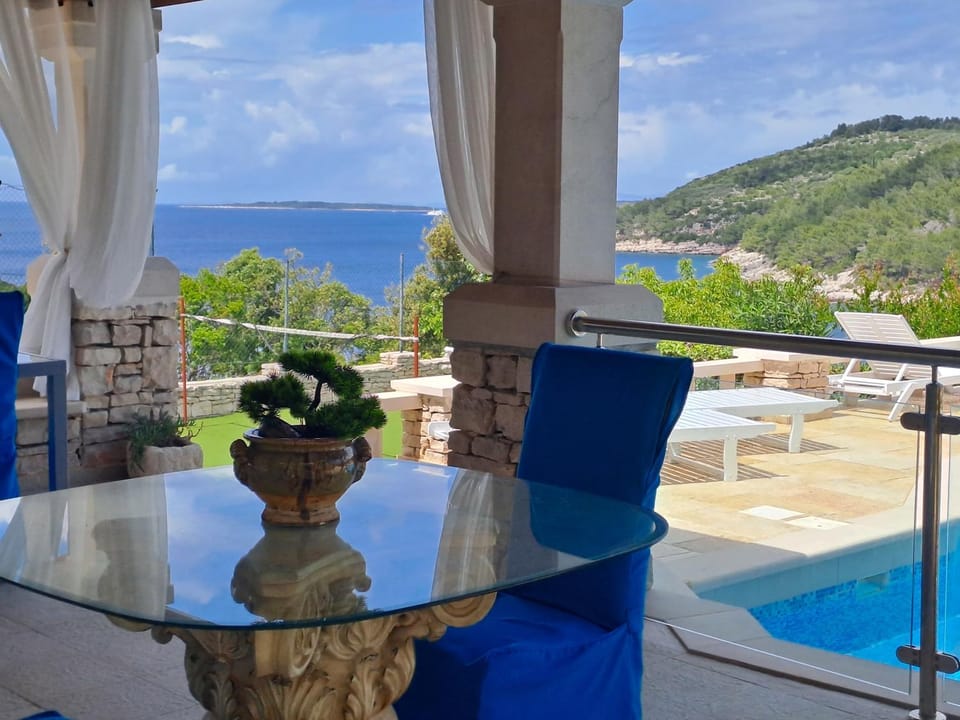 Patio, Communal lounge/ TV room, Day, Natural landscape, View (from property/room), Balcony/Terrace, Living room, Seating area, Dining area, Mountain view, Pool view, Sea view, Swimming pool