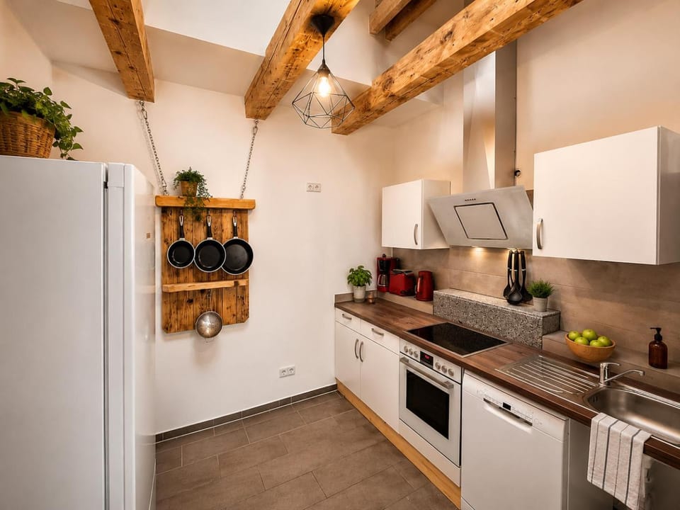 Kitchen or kitchenette, dishwasher, oven, stove, toaster