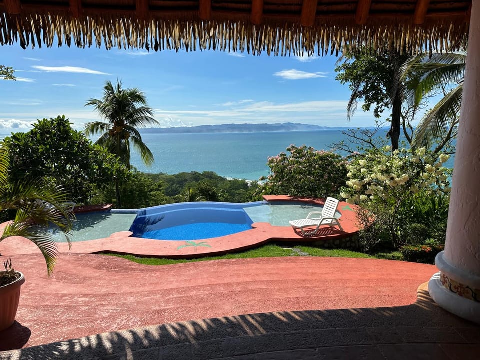 Patio, Day, Natural landscape, Pool view, Sea view, Swimming pool, sunbed