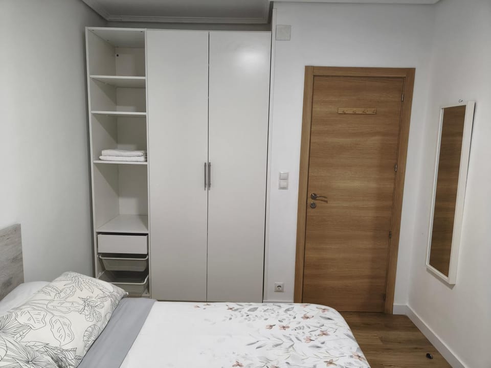 Bed, Bedroom, towels, wardrobe