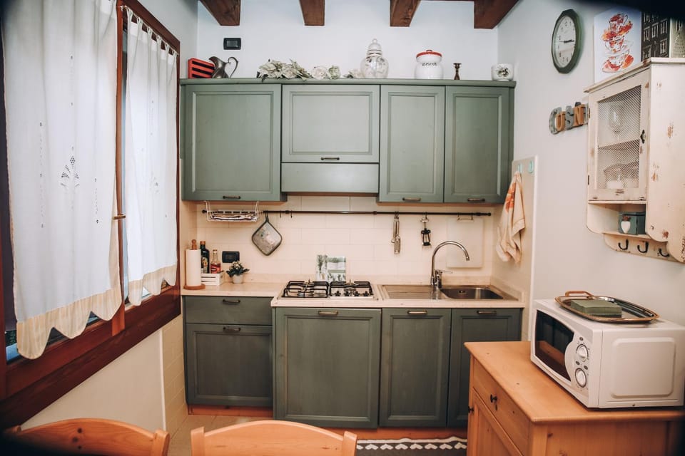 Kitchen or kitchenette, stove
