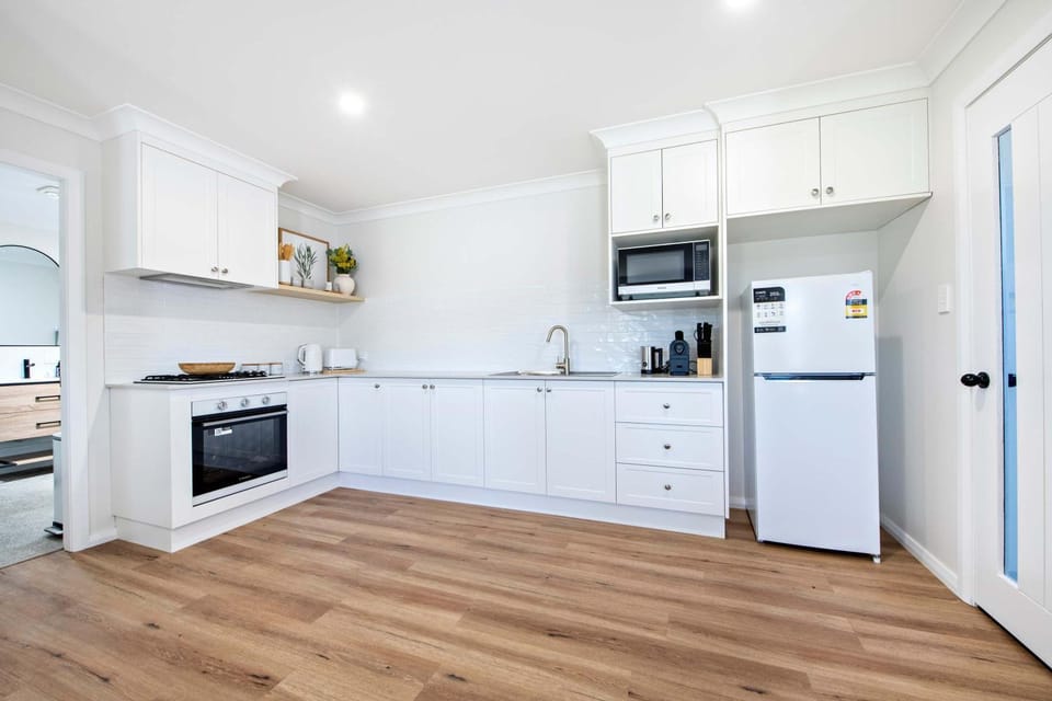 Kitchen or kitchenette, oven, stove, toaster