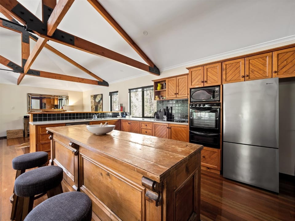 Kitchen or kitchenette, dishwasher, oven, stove