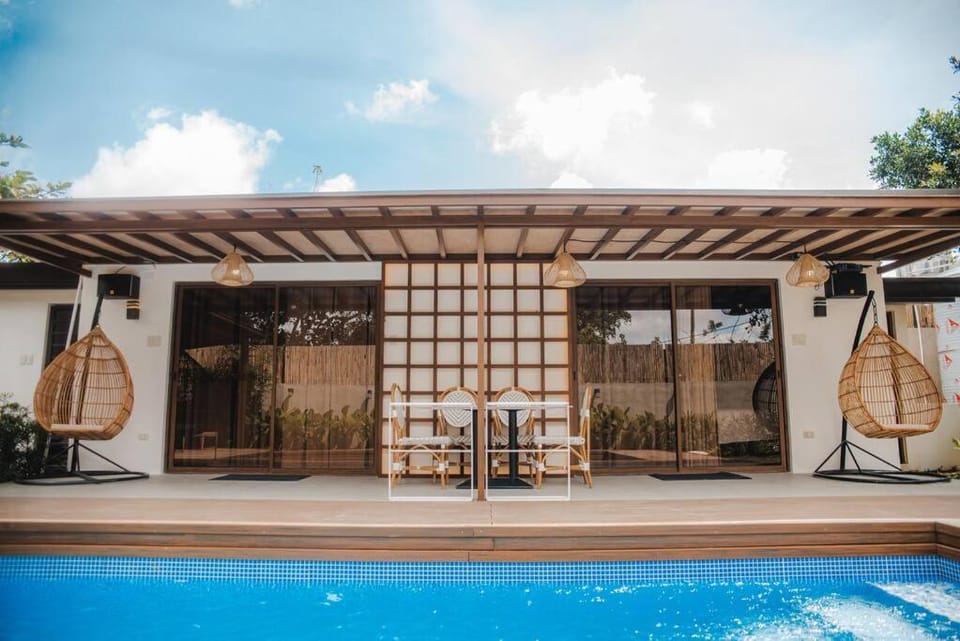 Property building, Patio, Day, Pool view, Swimming pool