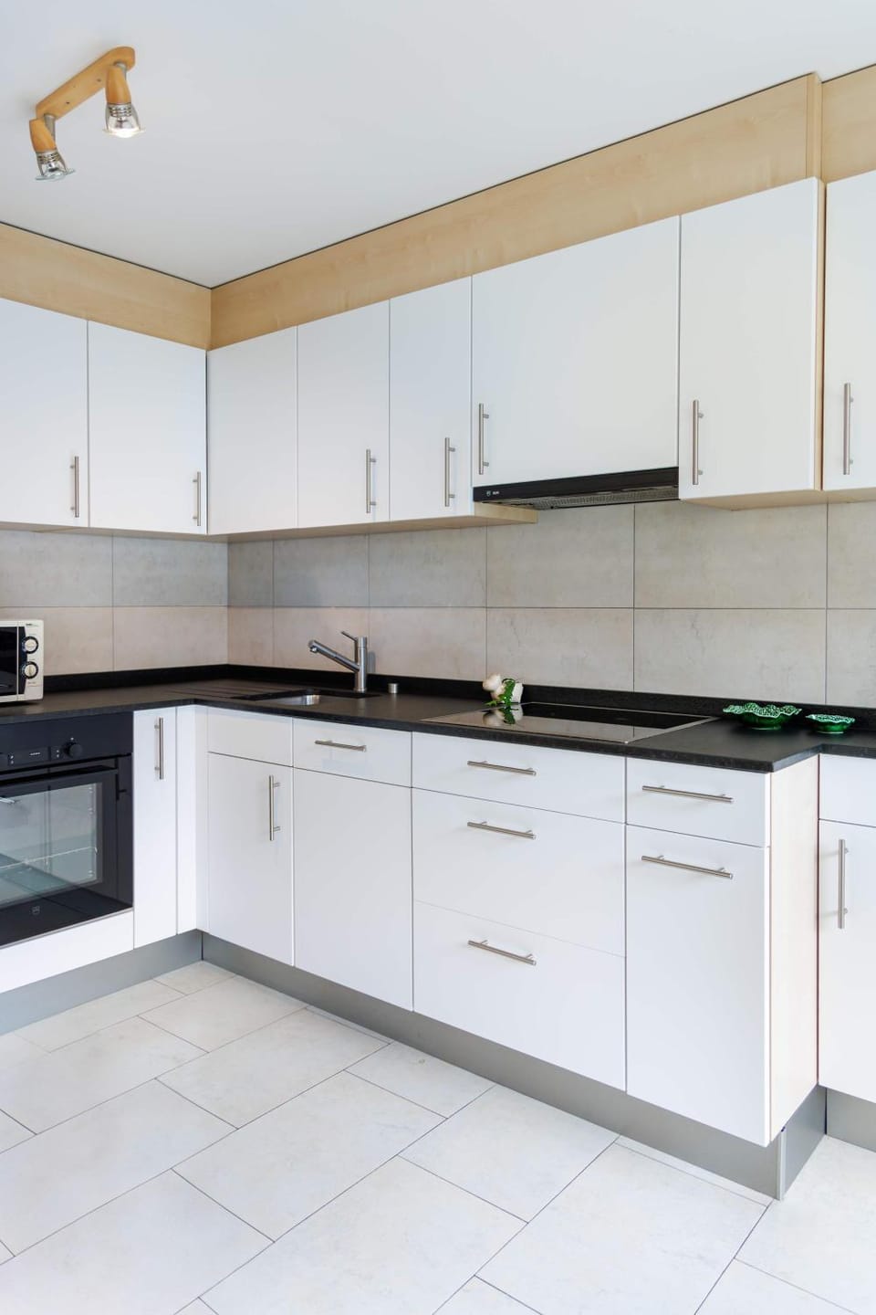 Kitchen or kitchenette, dishwasher, oven, stove