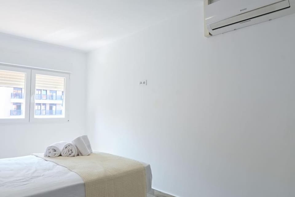 Bed, Photo of the whole room, Bedroom, towels, air conditioner