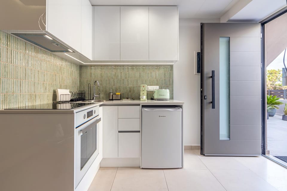 Kitchen or kitchenette, oven, stove