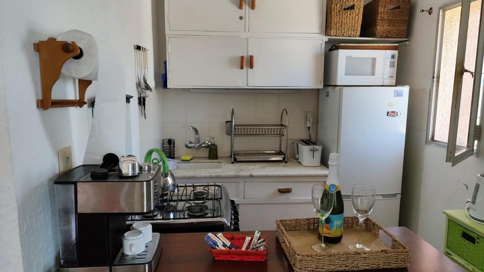 Kitchen or kitchenette, oven, stove, toaster