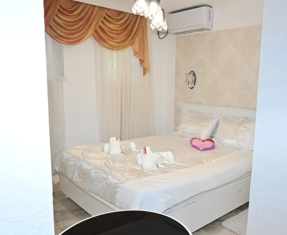Bed, Photo of the whole room, Bedroom, towels, air conditioner