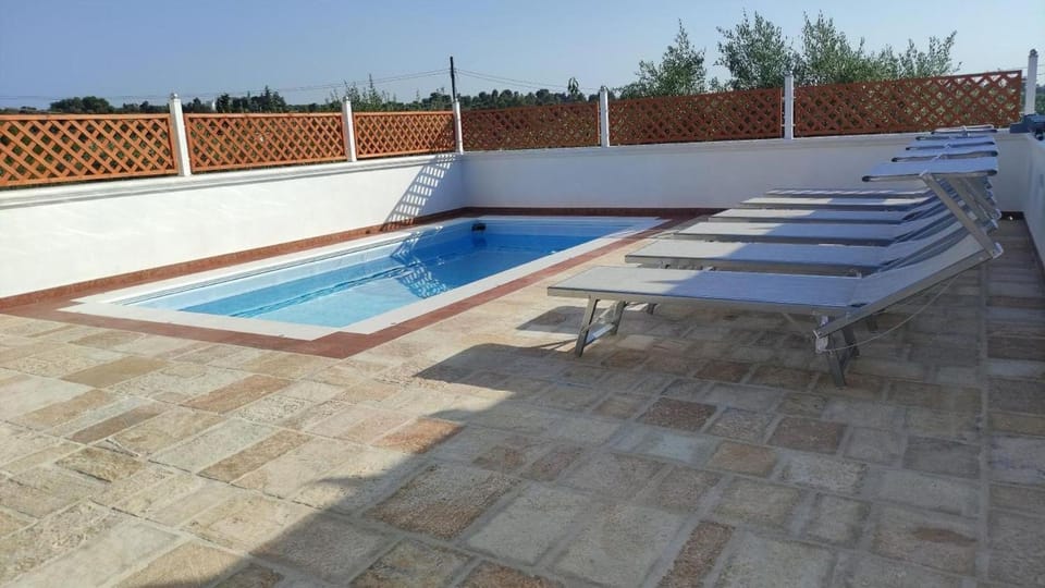 Property building, Living room, Swimming pool
