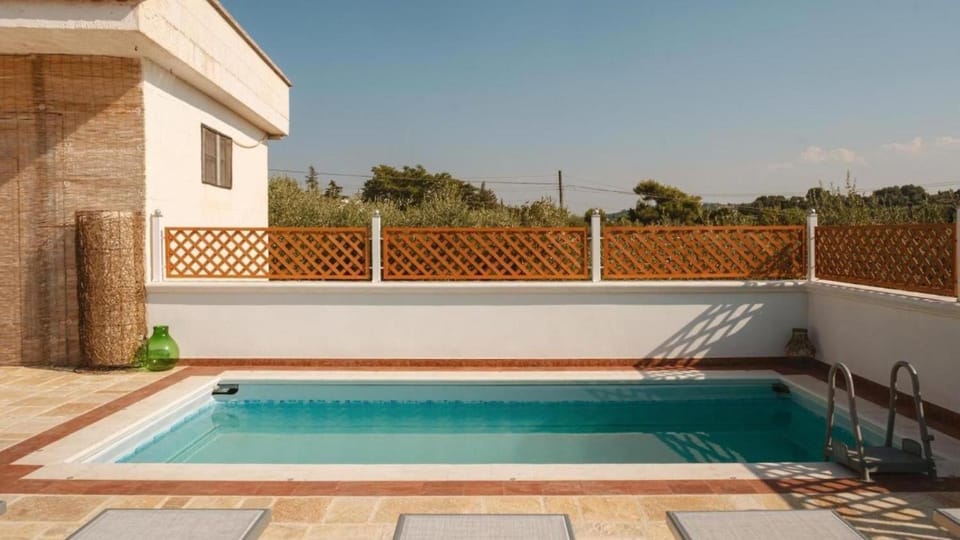 Property building, Living room, Swimming pool