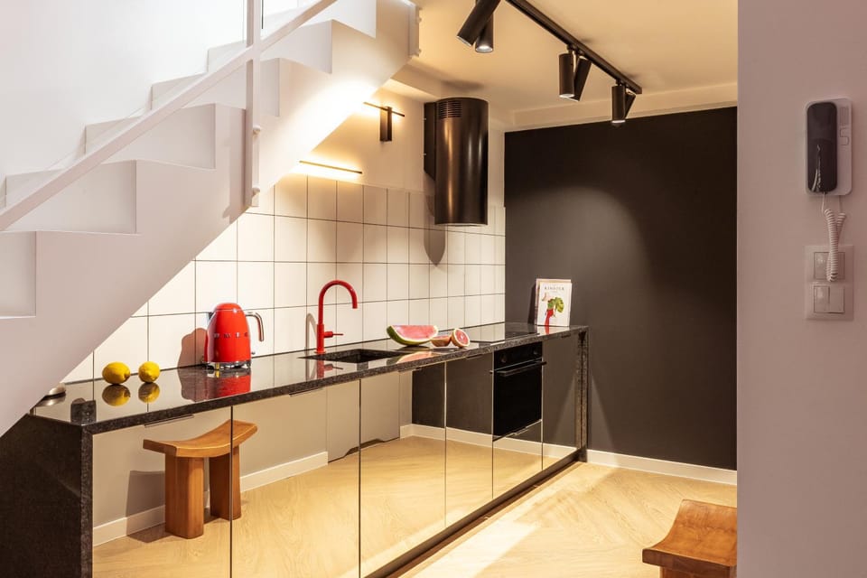 Kitchen or kitchenette, dishwasher, stove, toaster
