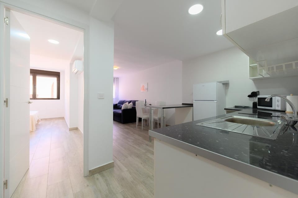 Kitchen or kitchenette, microwave, stove
