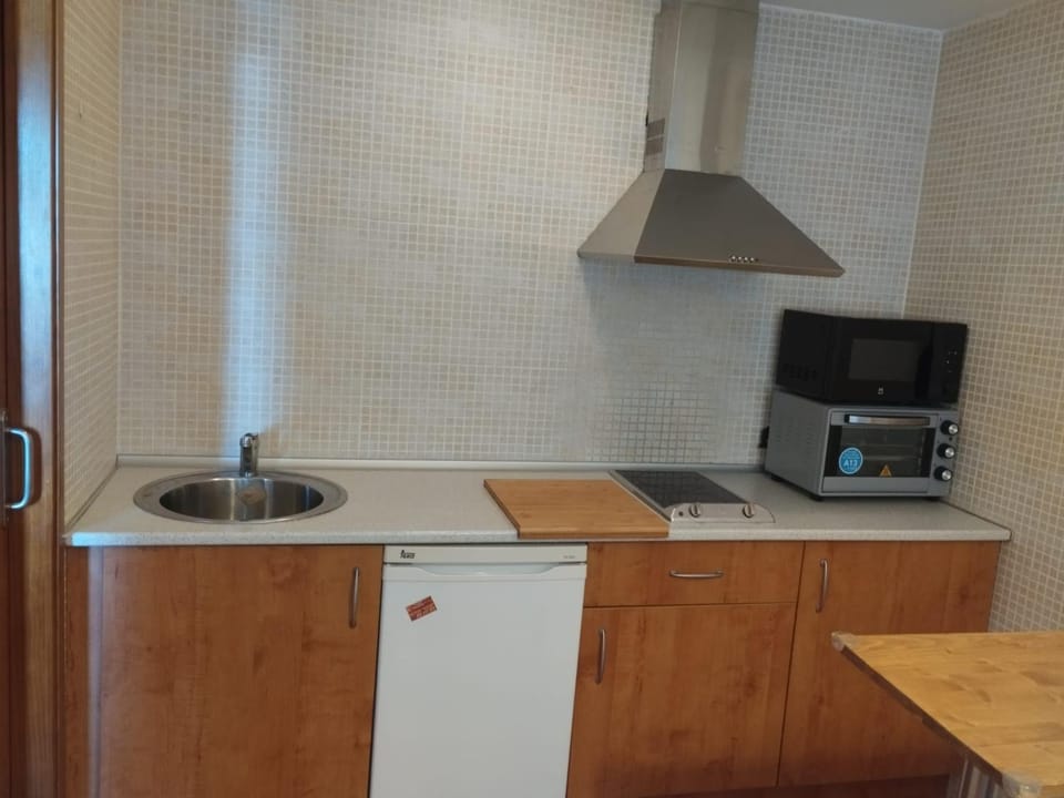 Kitchen or kitchenette, stove