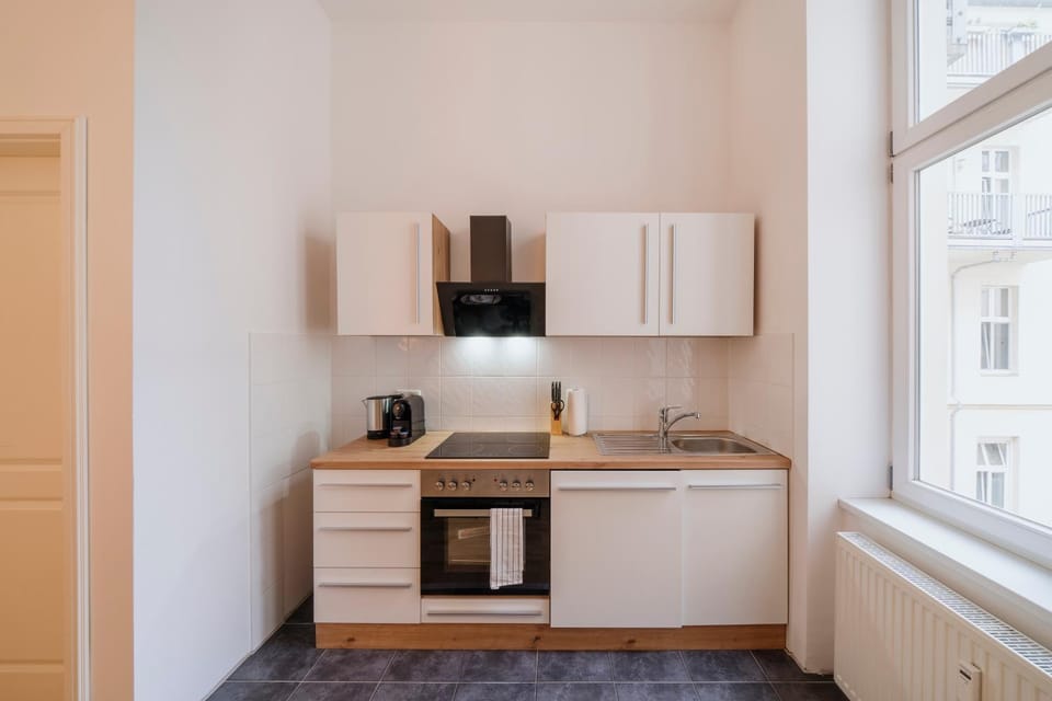 Kitchen or kitchenette, oven, toaster