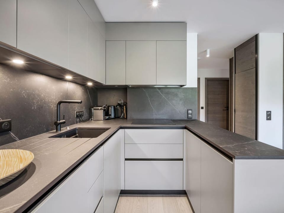 Kitchen or kitchenette, dishwasher, oven, stove, toaster