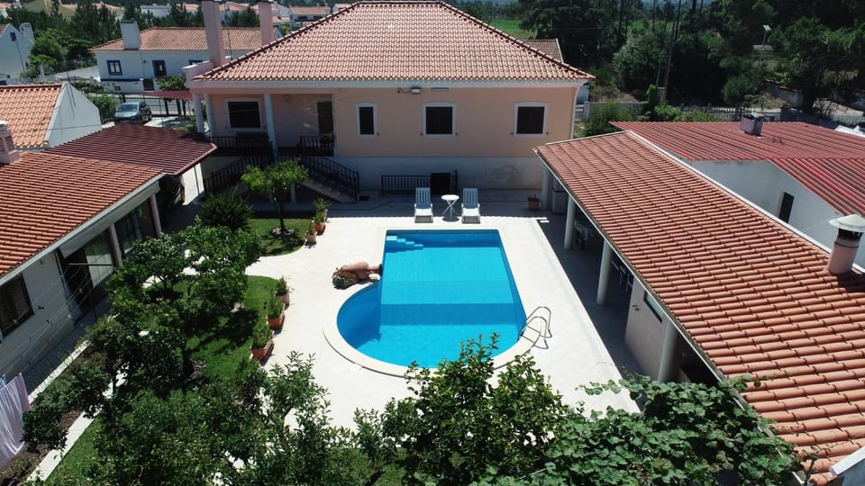 Property building, Living room, Swimming pool