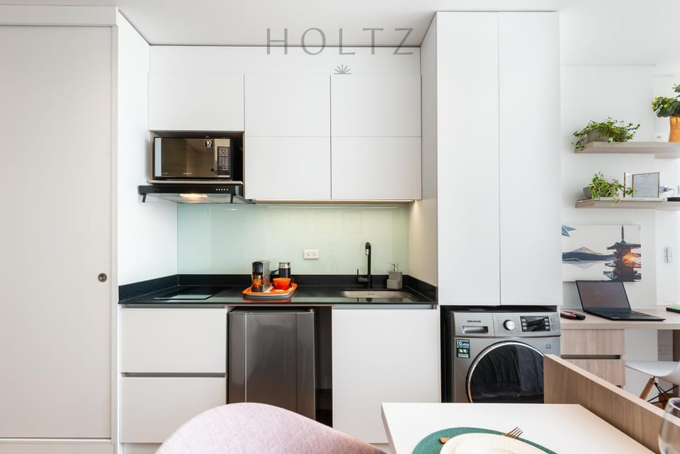Kitchen or kitchenette, dishwasher, minibar, oven, stove, toaster, washing machine