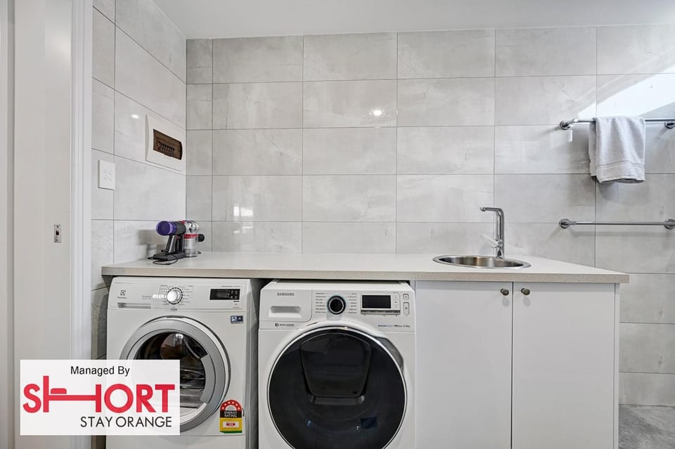 Bathroom, towels, washing machine, dryer