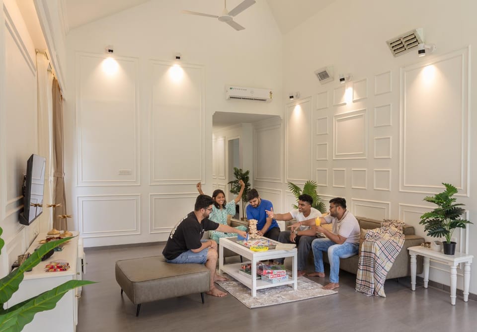People, TV and multimedia, Living room, Seating area, group of guests, fireplace, air conditioner