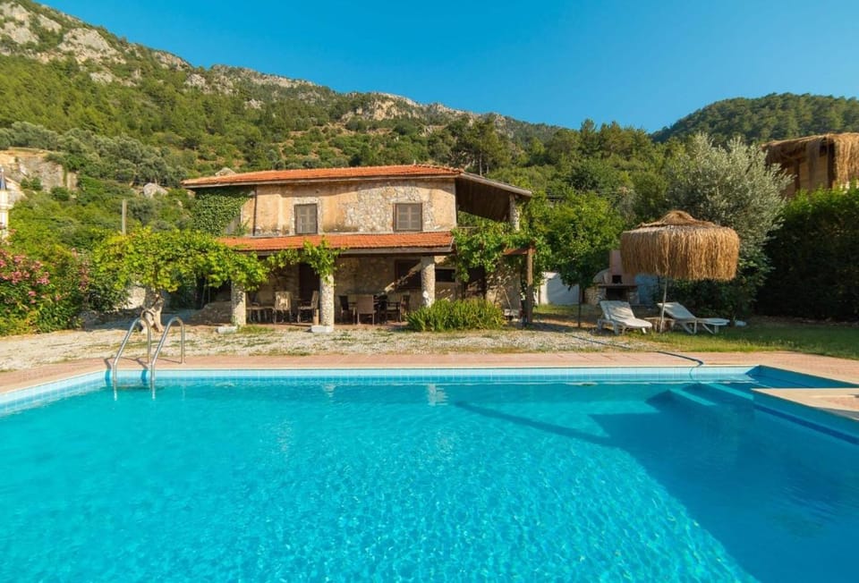 Property building, Natural landscape, Mountain view, Pool view, Swimming pool