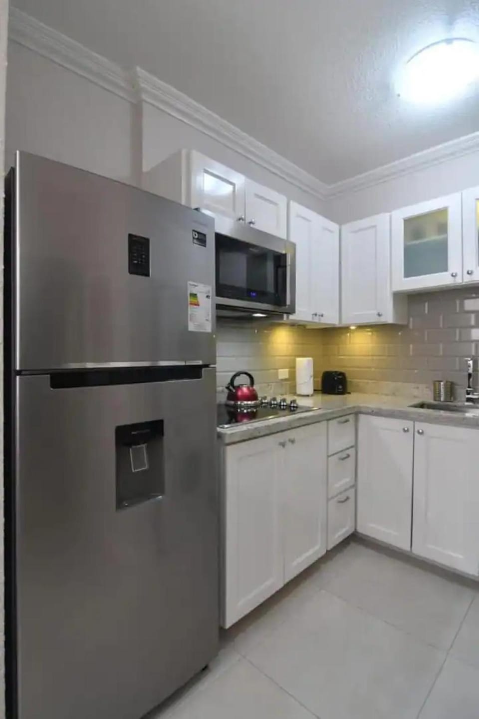Kitchen or kitchenette, oven, stove