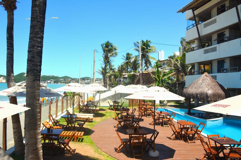 Property building, Natural landscape, Pool view, Swimming pool, sunbed