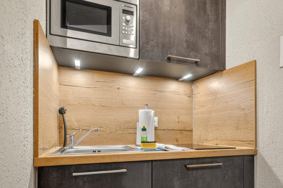 Kitchen or kitchenette, stove