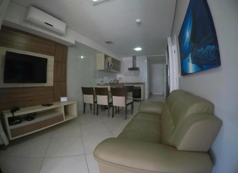TV and multimedia, Kitchen or kitchenette, Living room, Seating area, Dining area, oven, stove, air conditioner