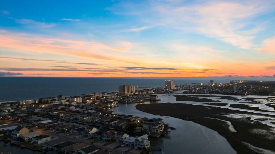 3BR Accessible Channel Unit w/ Shared Hot Tub & Waterfront Fire Pit | Walk to Beach House in North Myrtle Beach