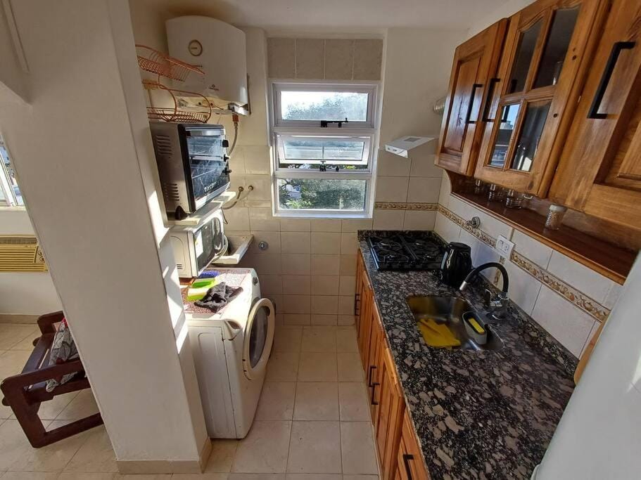 Kitchen or kitchenette, oven