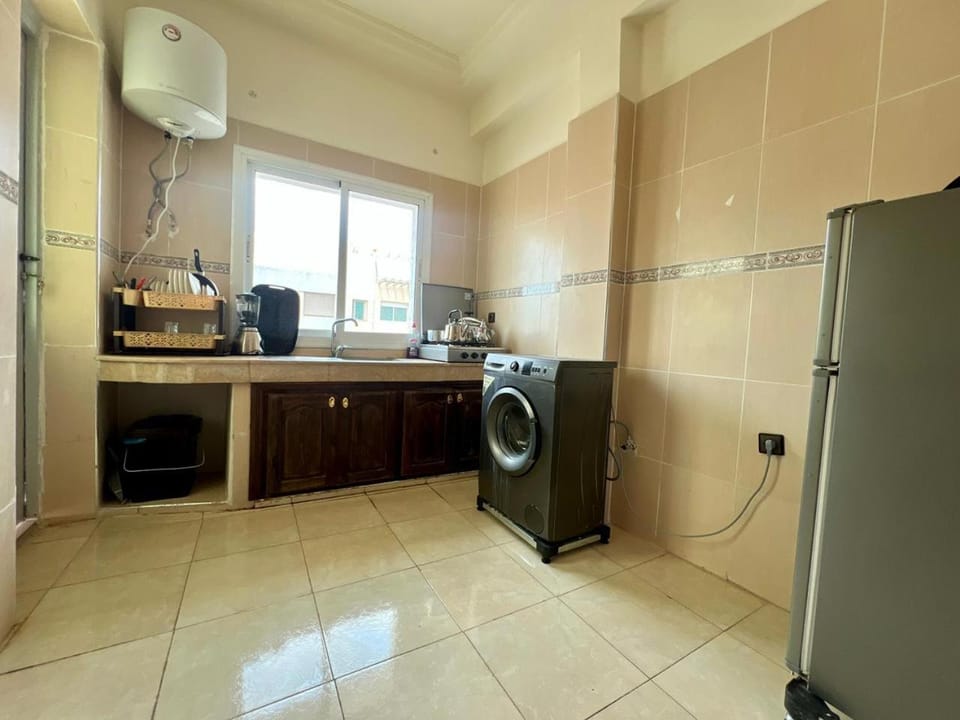 Kitchen or kitchenette, minibar, stove, toaster, washing machine, dryer