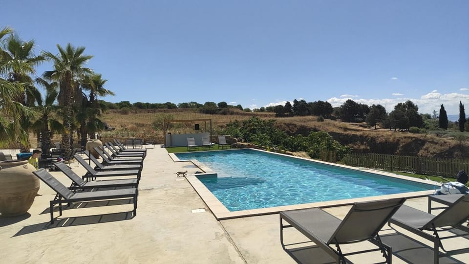 Patio, Day, Natural landscape, Pool view, Swimming pool, Swimming pool, sunbed