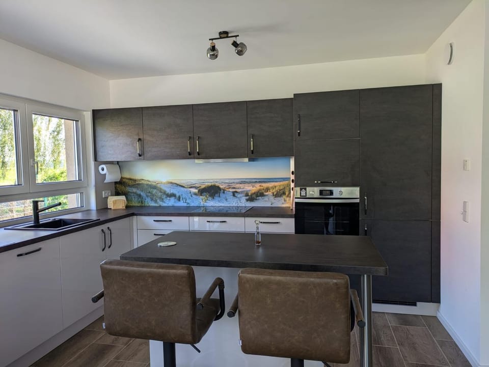 Kitchen or kitchenette, Dining area, dishwasher, oven, stove