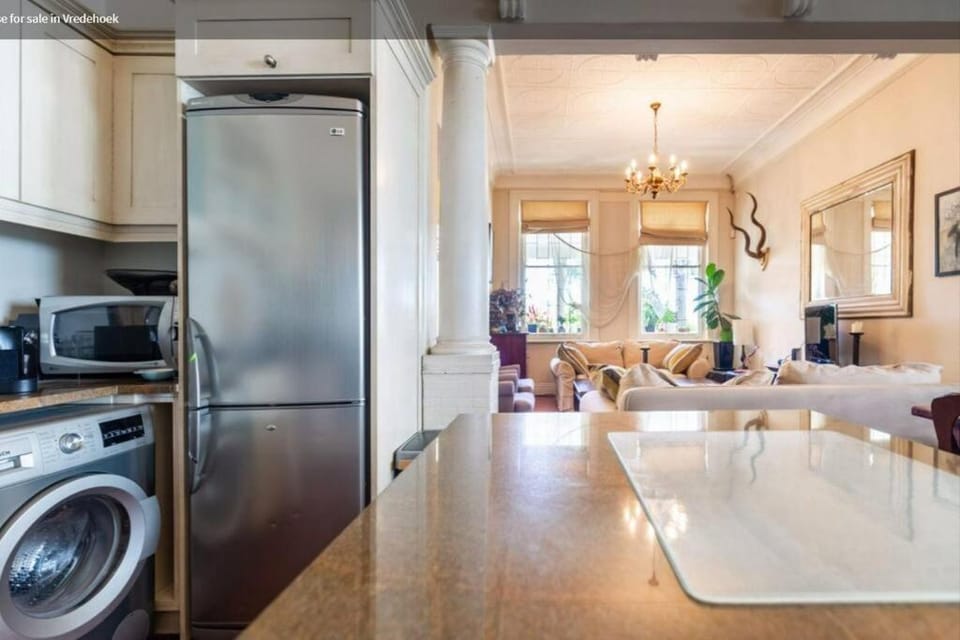 Kitchen or kitchenette, washing machine